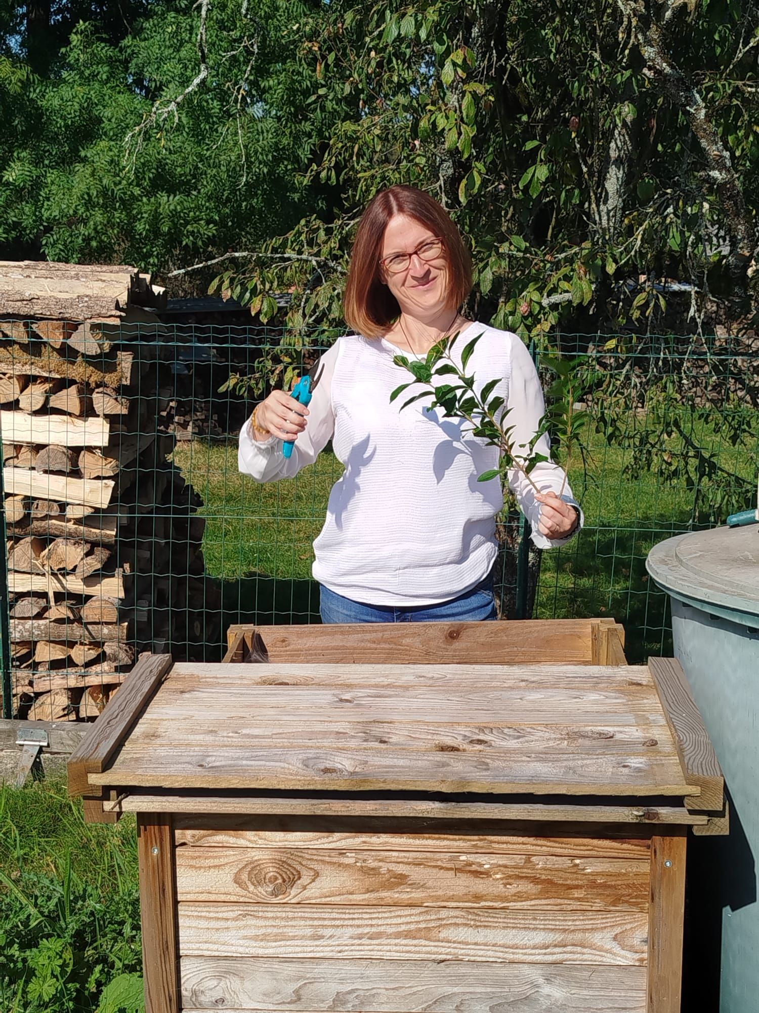 Aude Durant devant son composteur